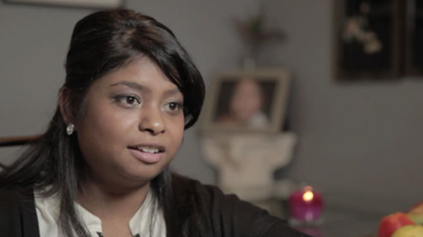 Jaya is shown speaking in her house