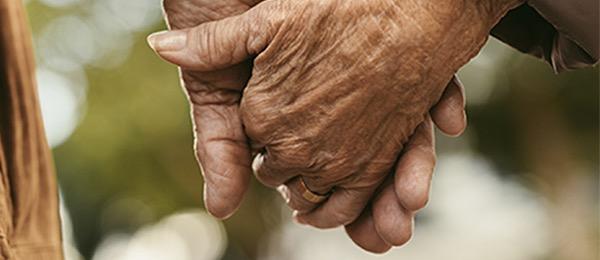 Couple out for a walk, holding hands